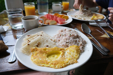 The hearty traditional maldivian breakfast Mas huni. It is a typical Maldivian breakfast, comprises...