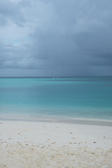Beautiful beach of Fulidhoo, Maldives during raining season, with gloomy weather.