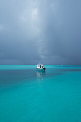 Beautiful beach of Fulidhoo, Maldives during raining season, with gloomy weather.