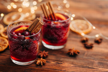 Cozy close-up of two glasswes with mulled wine. Christmas drink
