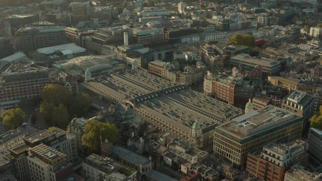 Dolly forward pan down aerial shot of London Farringdon Smithfield meat market