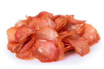 Heap Sliced and jerky meat isolated on a white background. Pile of beef jerky pieces.