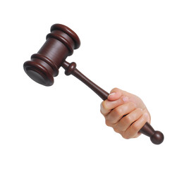 Hand holding trial judgement hammer on layered png background.