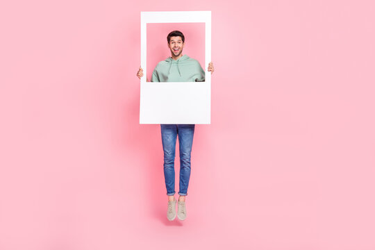 Full Length Photo Of Optimistic Boy Stylish Outfit Hold Big Frame Want Change Instagram Twitter Avatar Isolated On Pink Color Background