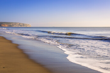 Calm morning after the storm high tide Sandown Beach Isle of Wight south east England