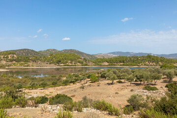 Panoramic view of Gadouras Dam. Solving the important and crucial water supply problems.
Near the villages of Lardos and Laerma in the southern part of the island. Rhodes, Greece.