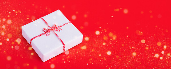 banner gift white box with red bow christmas background	
