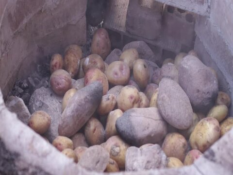 Pachamanca elaboration process in Peru. Food concept and traditions of Peru (South America).