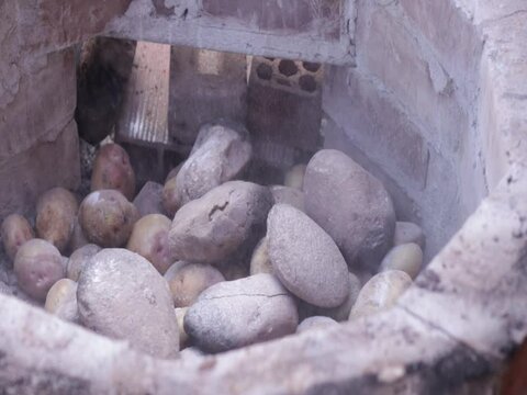 Pachamanca elaboration process in Peru. Food concept and traditions of Peru (South America).