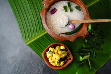 Kanji and Kappa- traditional kerala comfort food porridge with yucca, selective focus