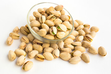 roasted pistachios on white background