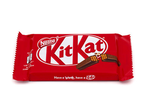 ROME, ITALY - NOVEMBER 14, 2022. Kit Kat chocolate bar isolated on white background. Kit Kat is a chocolate-covered wafer bar confection created by Rowntree, and now produced globally by Nestl&eacute;.