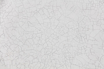 Cracked ceramic texture. Cracked white ceramic background.
