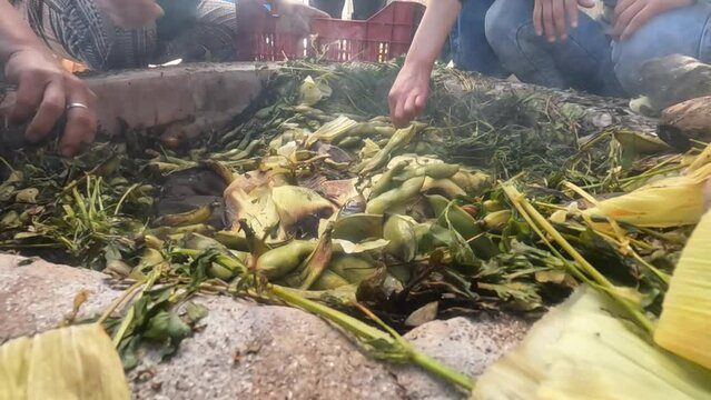 Pachamanca elaboration process in Peru. Food concept and traditions of Peru (South America).