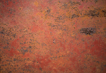Rusty metal texture. Photo of a rusty red background.Corrosion on the iron wall.