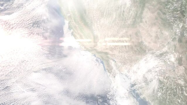 Earth zoom in from outer space to city. Zooming on Simi Valley, California, USA. The animation continues by zoom out through clouds and atmosphere into space. Images from NASA