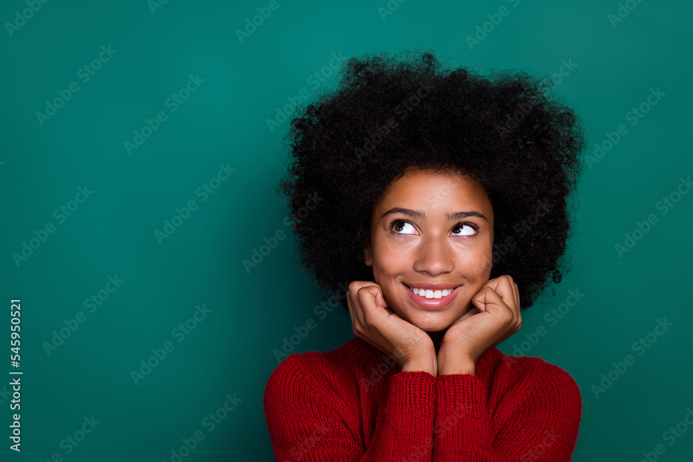 Sticker Photo of dreamy charming small schoolgirl wear red pullover arms cheeks looking empty space isolated green color background