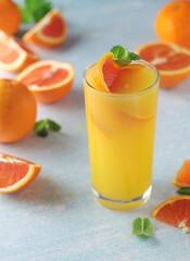 Red oranges juice with mint and ice