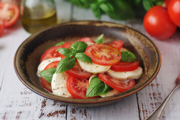 A bowl with traditional Italian caprese salad