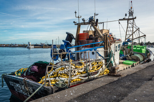 Sesimbra, Portugal - October 11, 2018: Boat on Fishermen Wharf in port of Sesimbra town