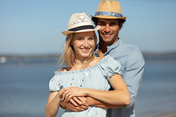 young couple relaxing at the beach