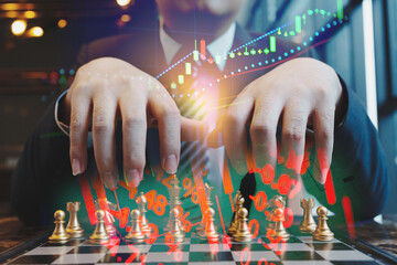 Double exposure of young business man and digital number of stock market background to represent...