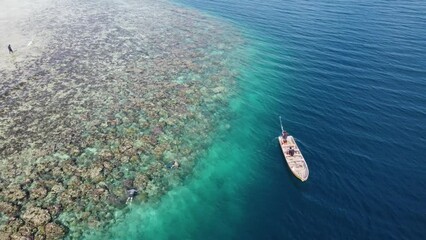 Snorkeling around remote tropical island in Buka, Bougainville, Papua New Guinea