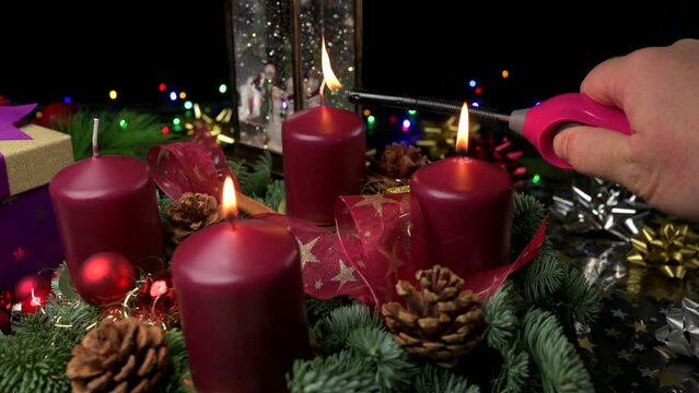 Advent wreath two lit candle and third being lit slider shot space for copy