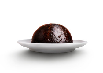 A traditional festive fruit Christmas steamed pudding isolated against a transparent background.