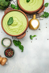 delicious broccoli soup with basil and cream, Diet detox food concept, vertical image. top view. place for text