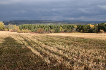 Fototapeta na wymiar A field after the autumn harvest, Sainte-Apolline, Québec, Canada