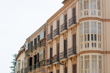 Balconys detail on old buidling in cadiz spain