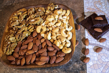 Nuts and chocolate on a plate