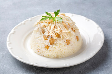 Traditional delicious Turkish food; Rice with chickpeas and chicken (Turkish name; Tavuklu nohutlu pilav or pilaf)