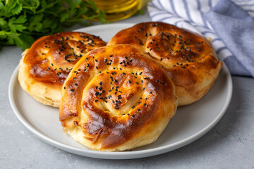 Traditional delicious Turkish phyllo stuffed with spinach, cheese (Turkish name; Gul borek or gul boregi) Rose shaped pastry.