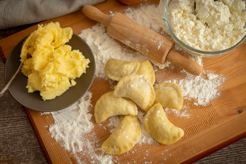 The process of cooking dumplings with potatoes and cottage cheese. Traditional Polish cuisine