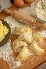 The process of cooking dumplings with potatoes and cottage cheese. Traditional Polish cuisine