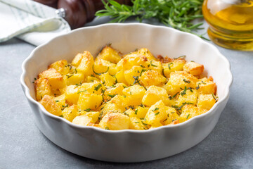 Baked potatoes with spices and rosemary