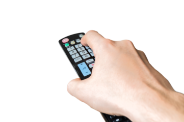 Man is holding TV remote controller for controlling television. Isolated on transparent background.