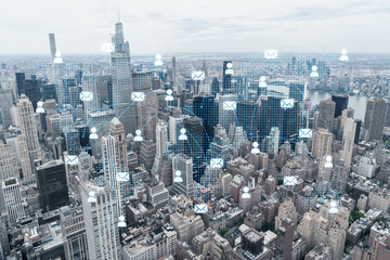 Fototapeta na wymiar Aerial panoramic city view of Upper Manhattan, the East Side, river and Brooklyn on horizon, New York city, USA. Social media hologram. Concept of networking and establishing new people connections