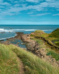 Vertical shot of a beautiful seascape seen from a coastal cliff