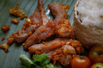 Thai food, fried pork with garlic The concept of popular Thai food in Lanna style.