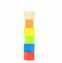 Closeup of colorful wooden blocks for children on a white background