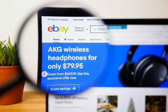 Logo Of EBay On A Laptop Screen Under A Magnifying Glass