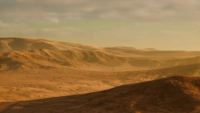 Sunset over the sand dunes in the desert