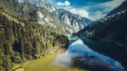 Naklejka na ściany i meble Scenic landscape of the Jiuzhaigou valley and mirror lake with the reflection of mesmerizing nature