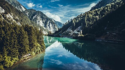 Scenic landscape of the Jiuzhaigou valley and mirror lake with the reflection of mesmerizing nature