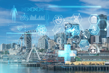 Seattle skyline with waterfront view. Skyscrapers of financial downtown at day time, Washington, USA. Health care digital medicine hologram. The concept of treatment and disease prevention