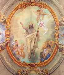 VARALLO, ITALY - JULY 17, 2022: The baroque ceiling fresco of Resurrection of Jesus in the church...
