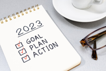 New year 2023 goal, plan, action checklist on notepad. Business motivation concept